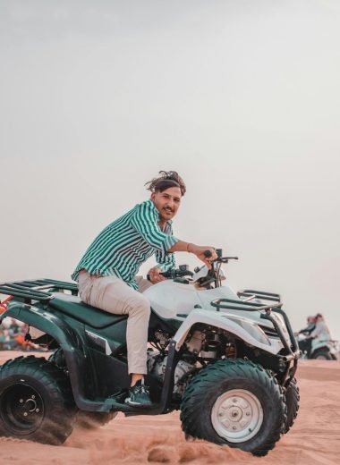 pexels-photo-26568793-26568793 Group riding quads in a vast desert landscape, exuding adventure and excitement.